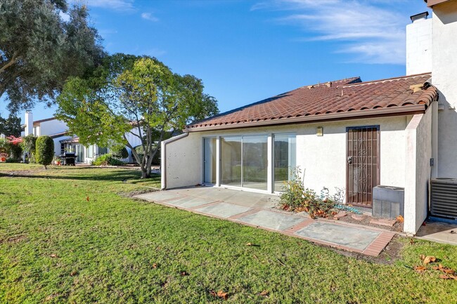 Building Photo - LOVELY ONE STORY CONDO WITH ONE CAR GARAGE