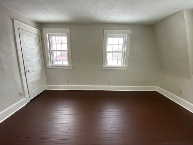 Building Photo - Cozy Akron Home w/ Fireplace Charm, Detached Garage & Back Porch