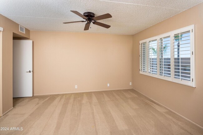 Building Photo - 7830 E Camelback Rd