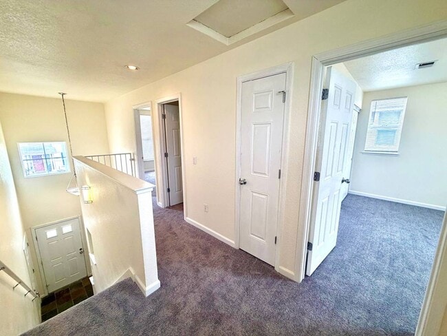Building Photo - Freshly Painted w/ New Carpets 3 Bedroom, 2 Bath With Attached Garage