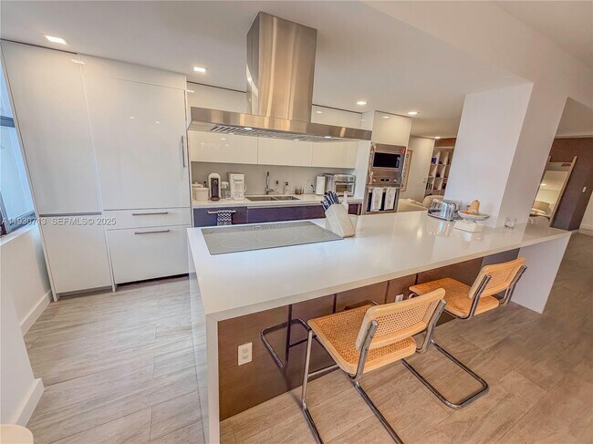 Building Photo - 9801 Collins Ave