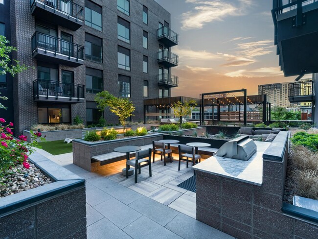 Our outdoor courtyard at Modera Golden Triangle is your personal oasis for al fresco dining and relaxed evenings. - Modera Golden Triangle