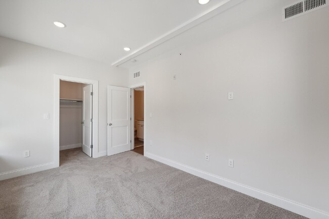 Building Photo - "NEW CONSTRUCTION Urban Living: Spacious 4...