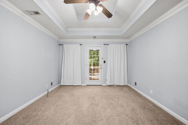 Building Photo - Stunning Stone Fireplace • Finished Basement • Fenced Yard