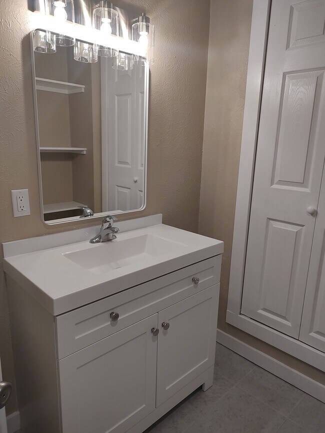 hallway bath vanity - 113 NW Main St