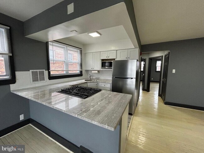 Building Photo - 8305-7 Michener Ave