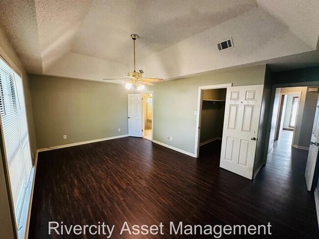 Building Photo - charming three-bedroom, two-full-bath resi...