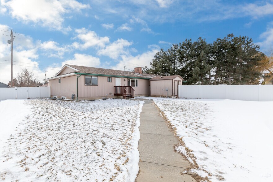 Storage shed and automatic sprinklers - 3507 E 57th Ave