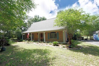 Building Photo - Charming Home in Poquito Bayou – A Nature ...