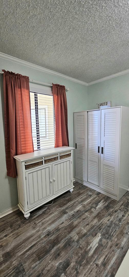 Building Photo - Dreamy Little River Condo — Furnished, Elevator Access, Pool & Marina Nearby!