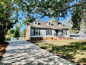 Building Photo - Welcome to view, a charming 4-bedroom, 2-bathroom home located in the heart of Charlotte, NC.