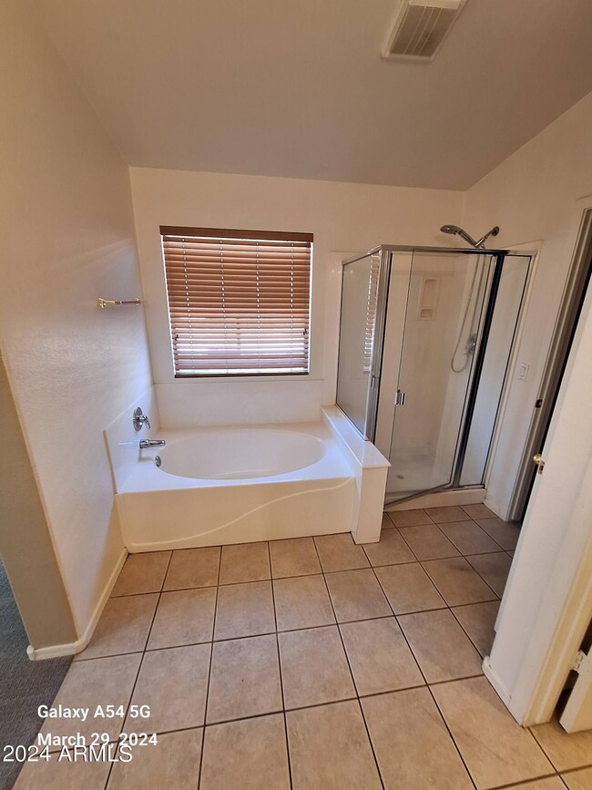 Building Photo - 9205 W Lone Cactus Dr