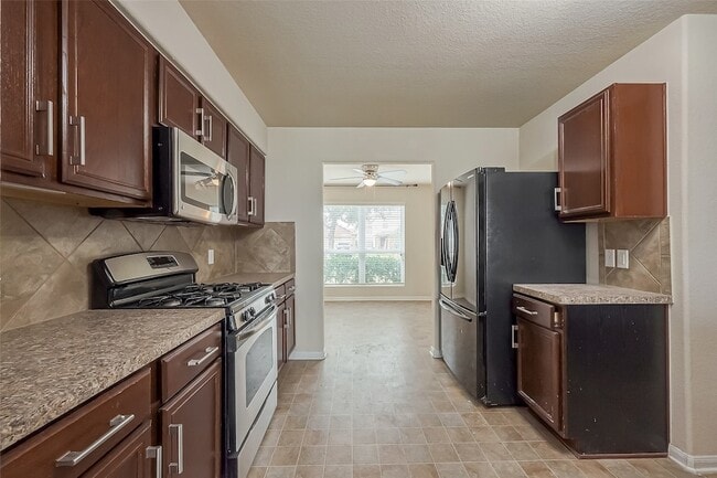 Building Photo - 13510 Dahlia Green Way