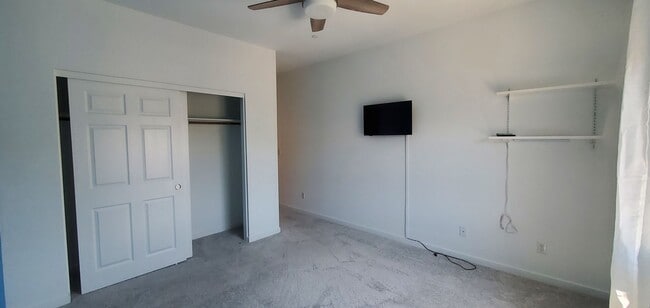 Building Photo - Beautiful townhome features a bright, open-concept layout