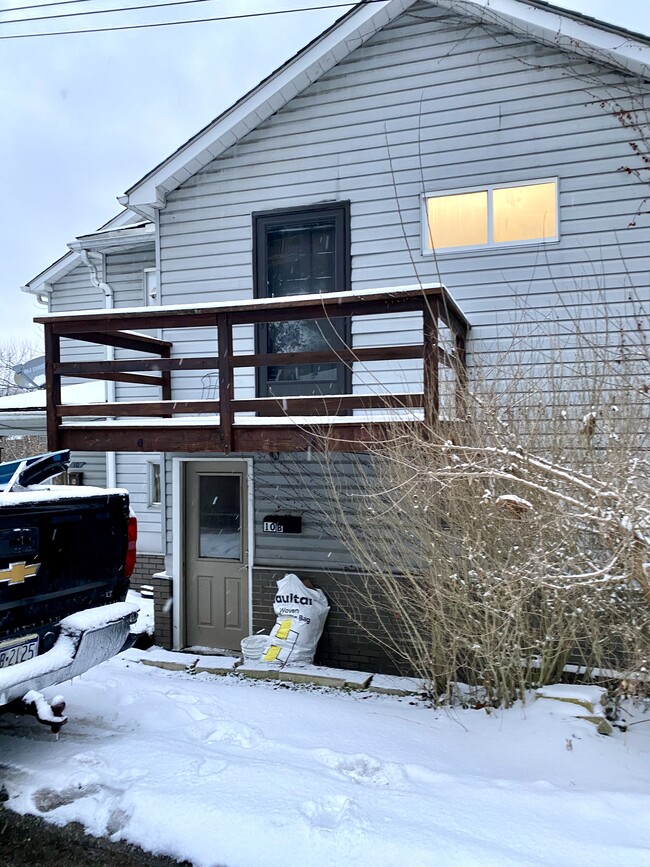 Apartment B entrance and small deck off bedroom. - 10 Willard St