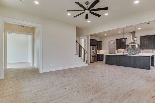 Building Photo - This luxurious new custom home in the sought-after Shadow Grove subdivision is a masterpiece of m...
