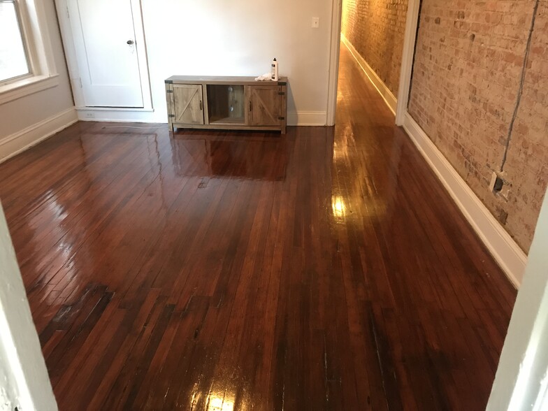 Living room. (TV can be removed upon tenants request prior to moving in or included for free). - 1519 Park Rd NW