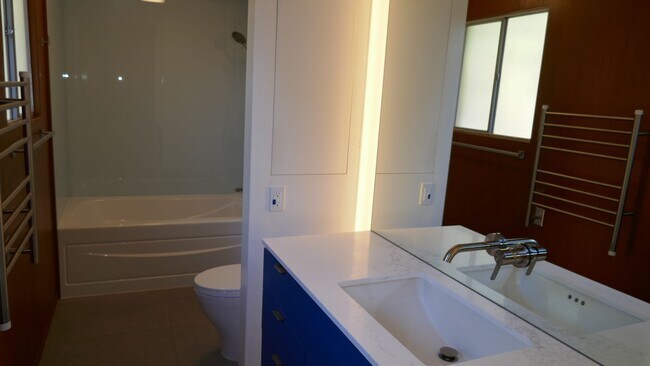 Building Photo - BEAUTIFUL UPDATED FOUR BED / TWO BATH PLUS OFFICE EICHLER HOME WITH GREAT OUTDOOR SPACE