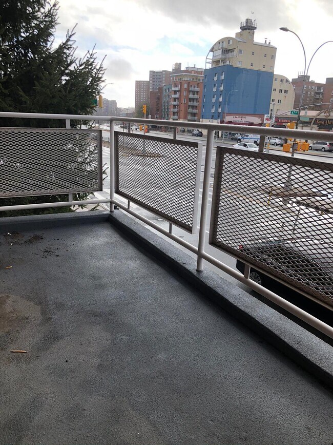 Building Photo - 10025 Queens Blvd