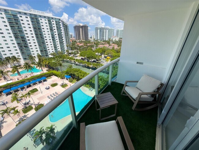 Building Photo - 19370 Collins Ave