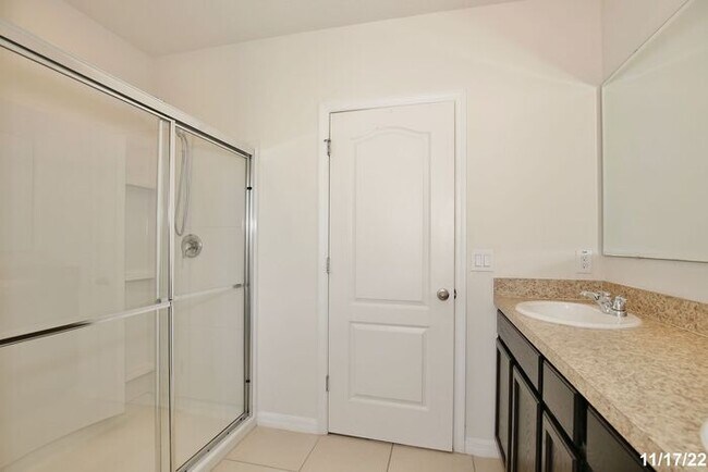 Building Photo - Spacious 3/2.5 Townhome with a 2 Car Garage and a Beautiful Pond View in Westwood Condos - Orlando!