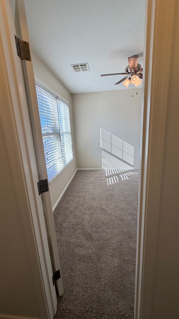 Building Photo - Spacious Surprise home with large backyard