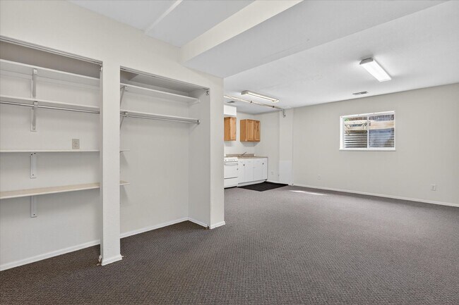 Building Photo - 4BR/4BA Updated Home with Finished Basement Suite & Landscaped Yard