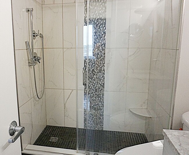 Building Photo - A Modern Living of Top-Level Unit in the C...
