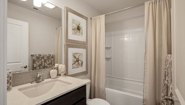 Building Photo - Spacious and Beautifully Landscaped Single...