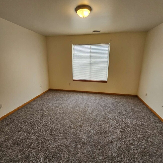 Building Photo - 2 Bedroom Upper Condo w/ Open Kitchen to Living Room Space. All Appliances Included along with Wa...