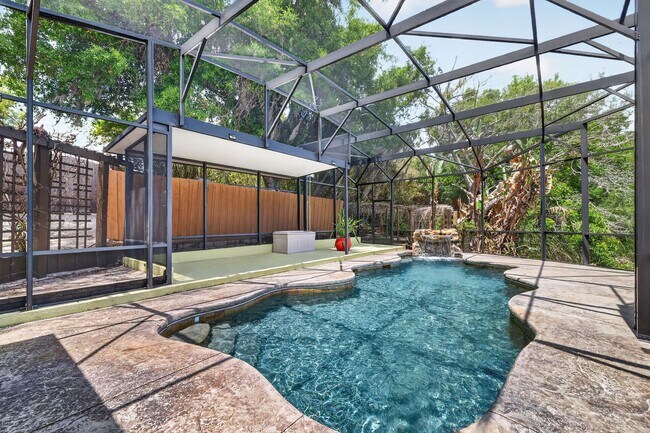 Building Photo - Available Now! Waterfront Living at Its Best – Pool, Decks & Gated Privacy