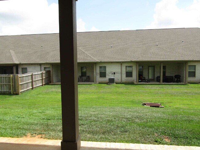Building Photo - Spacious Cantonment Townhome with Open Layout, 2-Car Garage, Covered Back Porch & Easy Access to ...