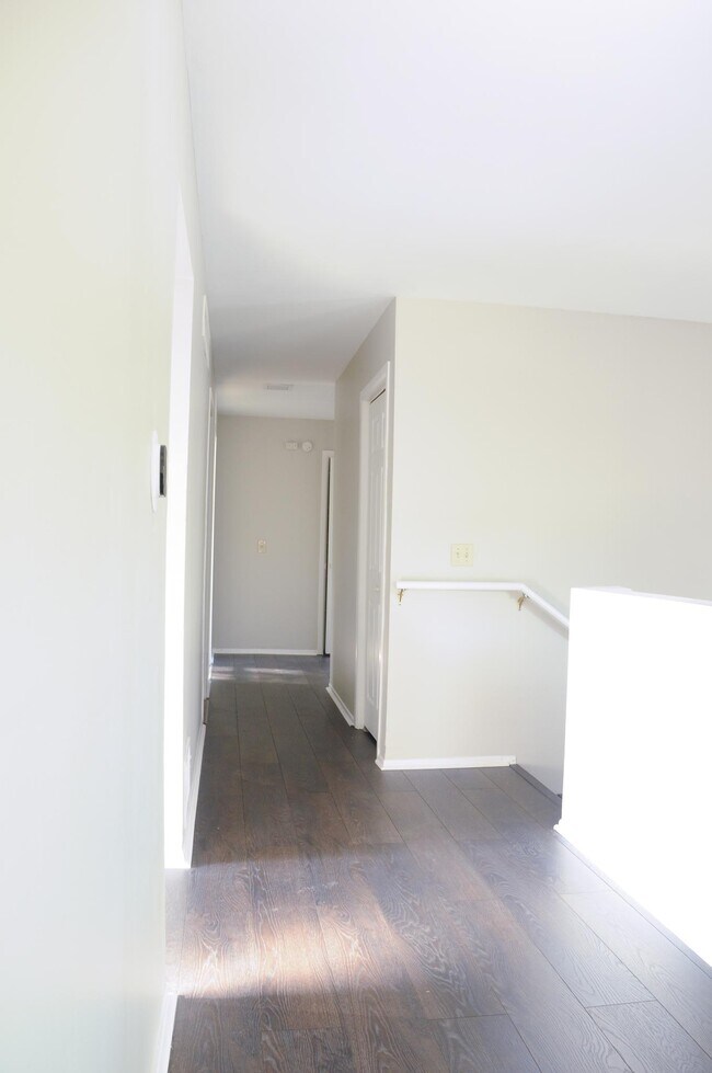 Hallway to bedrooms - 152 Farm Gate Ln