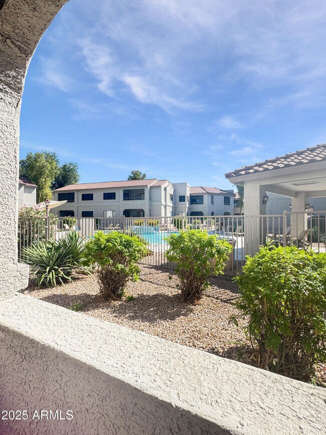 Building Photo - 9455 E Raintree Dr