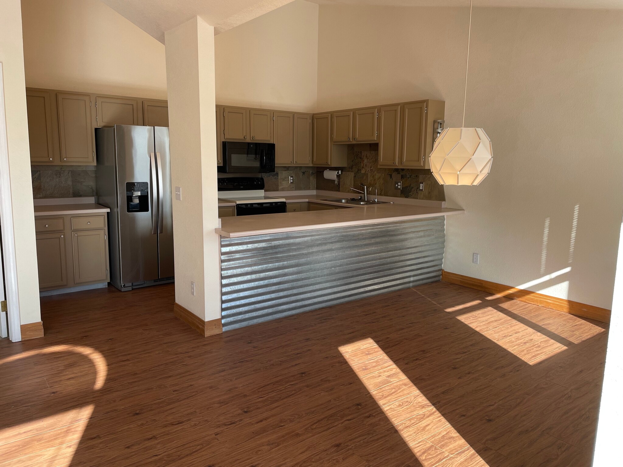 NEW FLOORS THROUGOUT ENTIRE HOUSE, except bathrooms and laundry - 535 Canyon View Drive