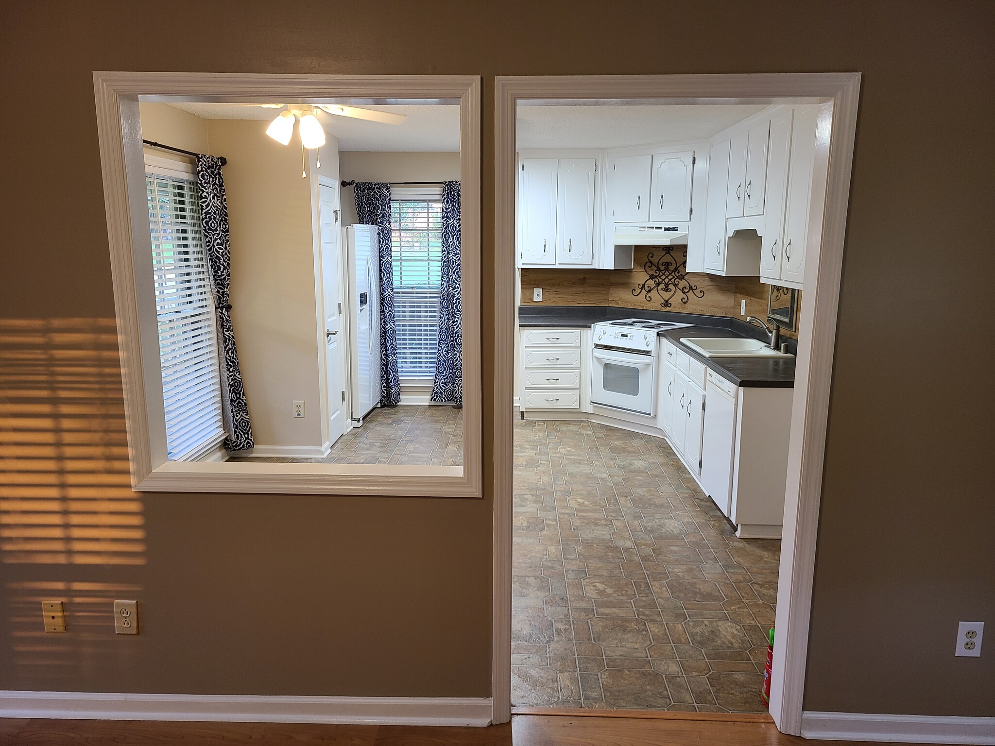 Living room open into the kitchen - 104 Bridgestone Dr NE