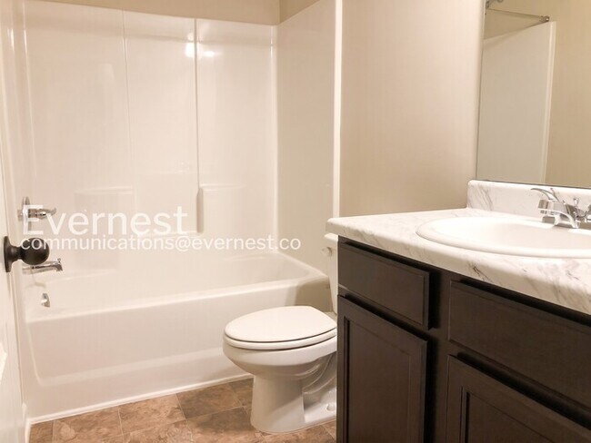 Building Photo - 4 Bed/2.5 Bath Home with Garage / Pet-Friendly / Vouchers Accepted / Coming Soon!