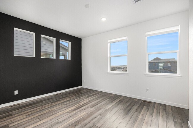 Building Photo - Sterling Ranch Stunner!!