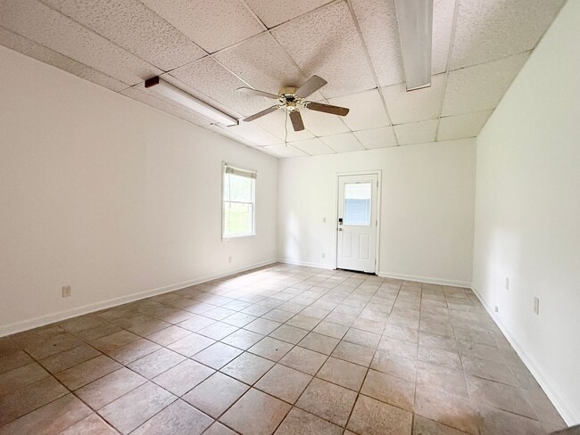 Building Photo - 2-Bedroom Home with Bonus Room & Large Wooden Deck | Pet-Friendly Near I-40 & City Lake