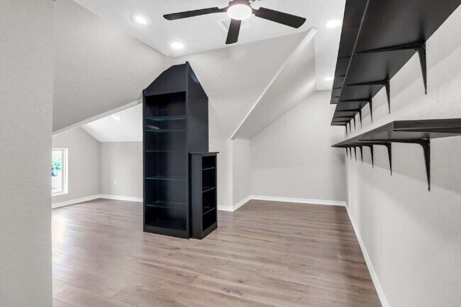 Building Photo - "Spacious 4-Bedroom Sanctuary with Cozy Fireplace in San Antonio's Prime Location!"