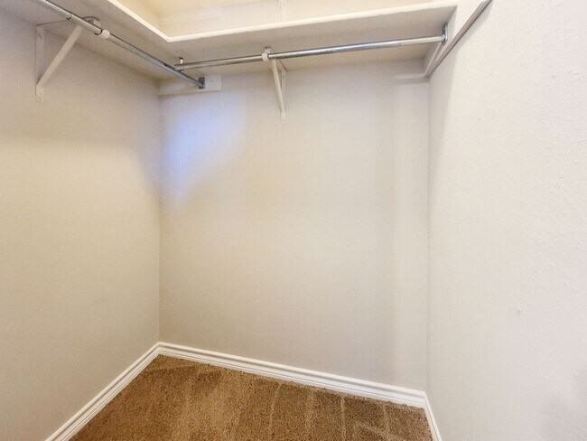 Building Photo - Warm & Inviting 4BR / 2.5BA Home with Covered Deck and 2-Car Garage