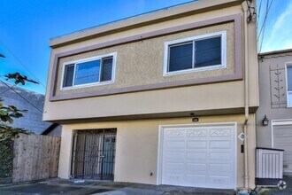 Building Photo - Light filled home+ Pet Friendly + Deck+ Lo...
