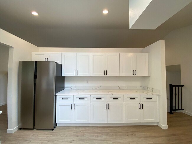 Building Photo - Stylishly Renovated Home with Private Back...