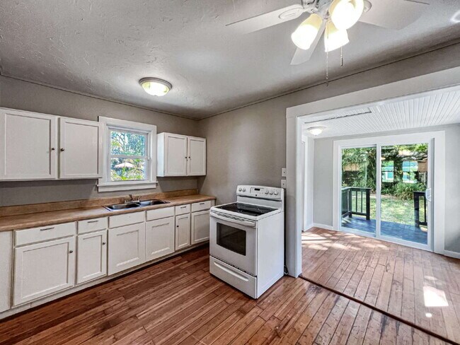 Building Photo - Deck the halls or the French doors, becaus...