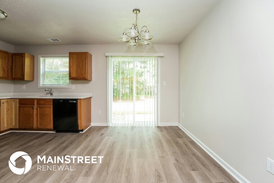 Building Photo - 6930 Red Bone Way