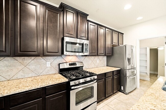 Building Photo - A Home That Adapts to You – Luxury, Flexibility & Entertainment Await!
