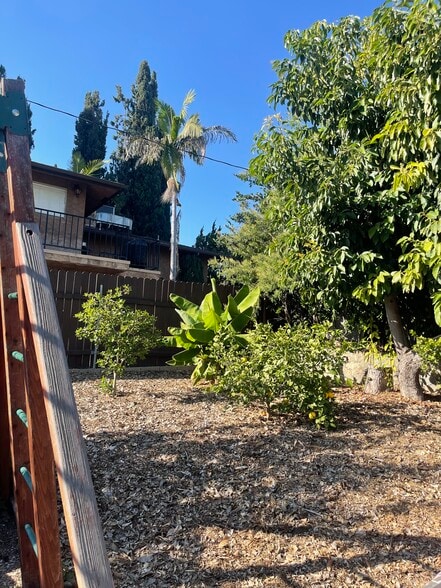 Back yard w/playset for children - 147 N Baldwin Ave