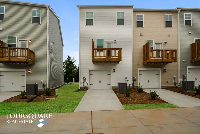 Building Photo - Modern 3-Story Townhome with First-Level Bedroom, Open Floor Plan & Community Pool – Prime RTP Lo...