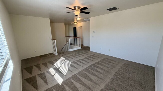 Building Photo - Two Story Home with NEW tile and a large backyard!