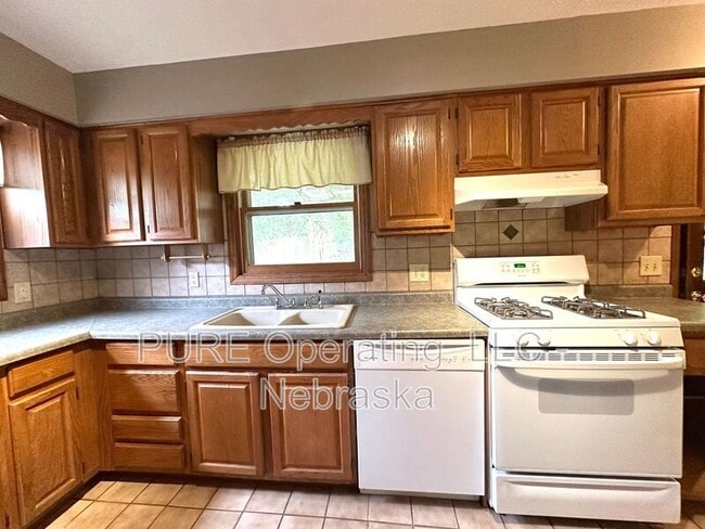 Building Photo - 1009 N 49th Ave